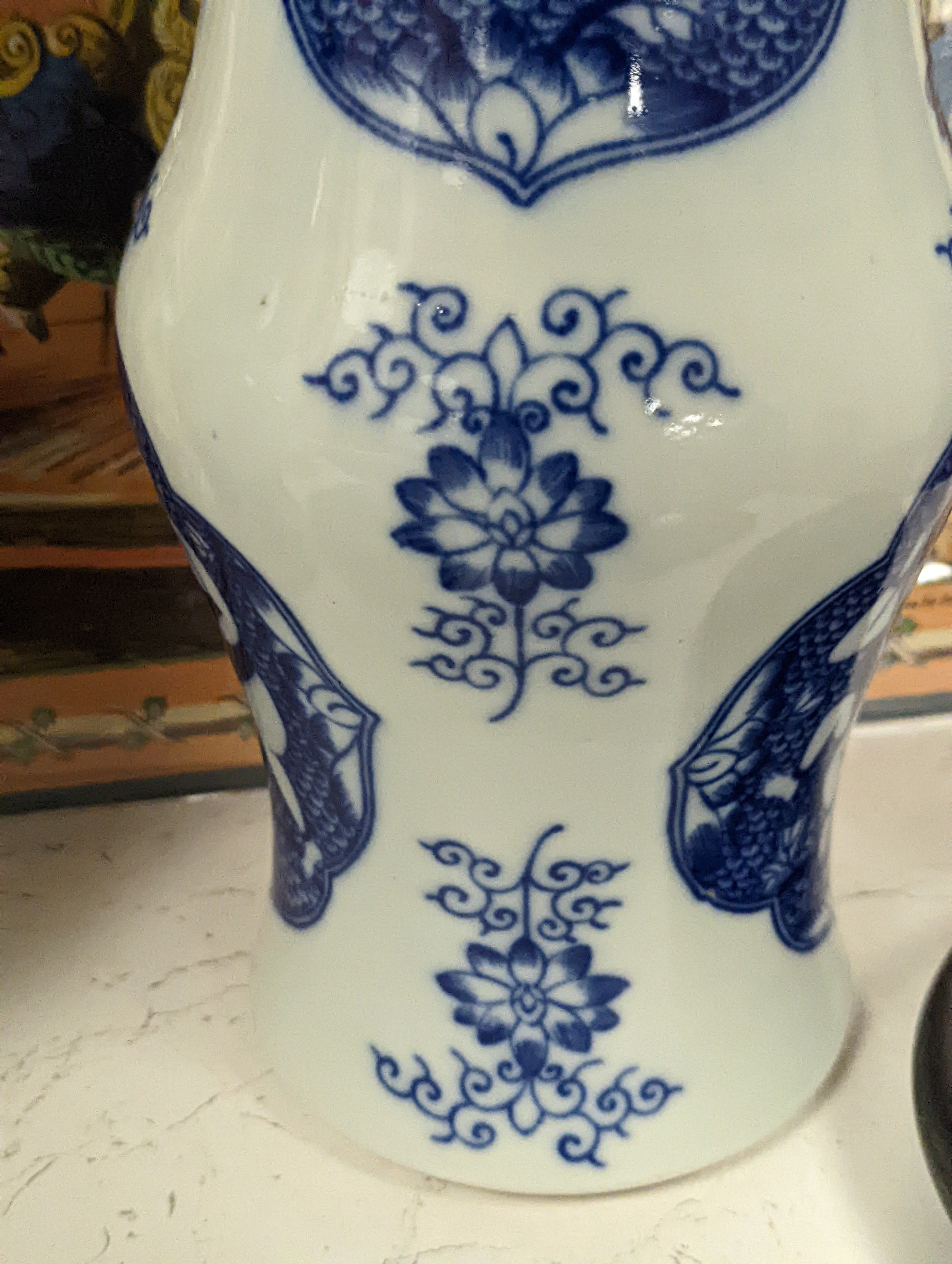 A pair of Chinese blue and white vases on stands and 4 further wood stands. Vases 35cm